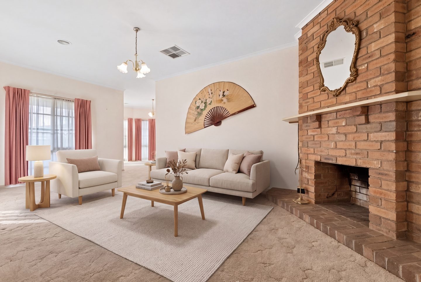 Lounge with a brick fireplace and a view towards the bay-windowed room