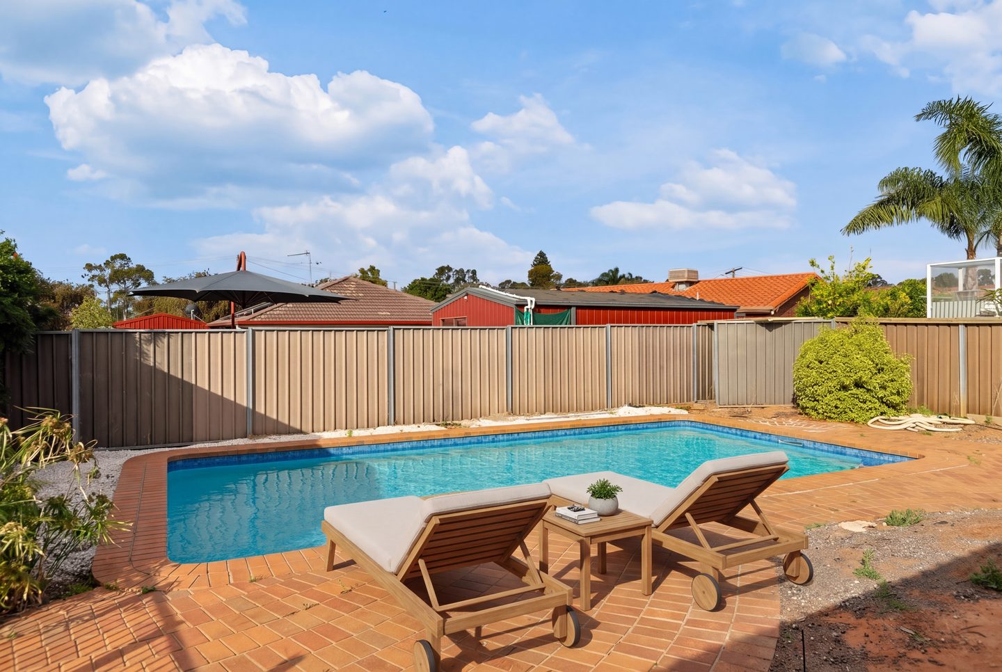Inground pool and paved surrounds