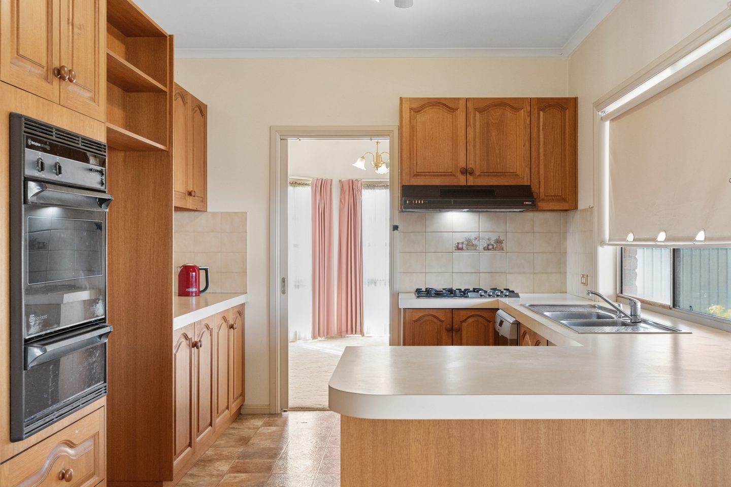 Kitchen storage and wall oven