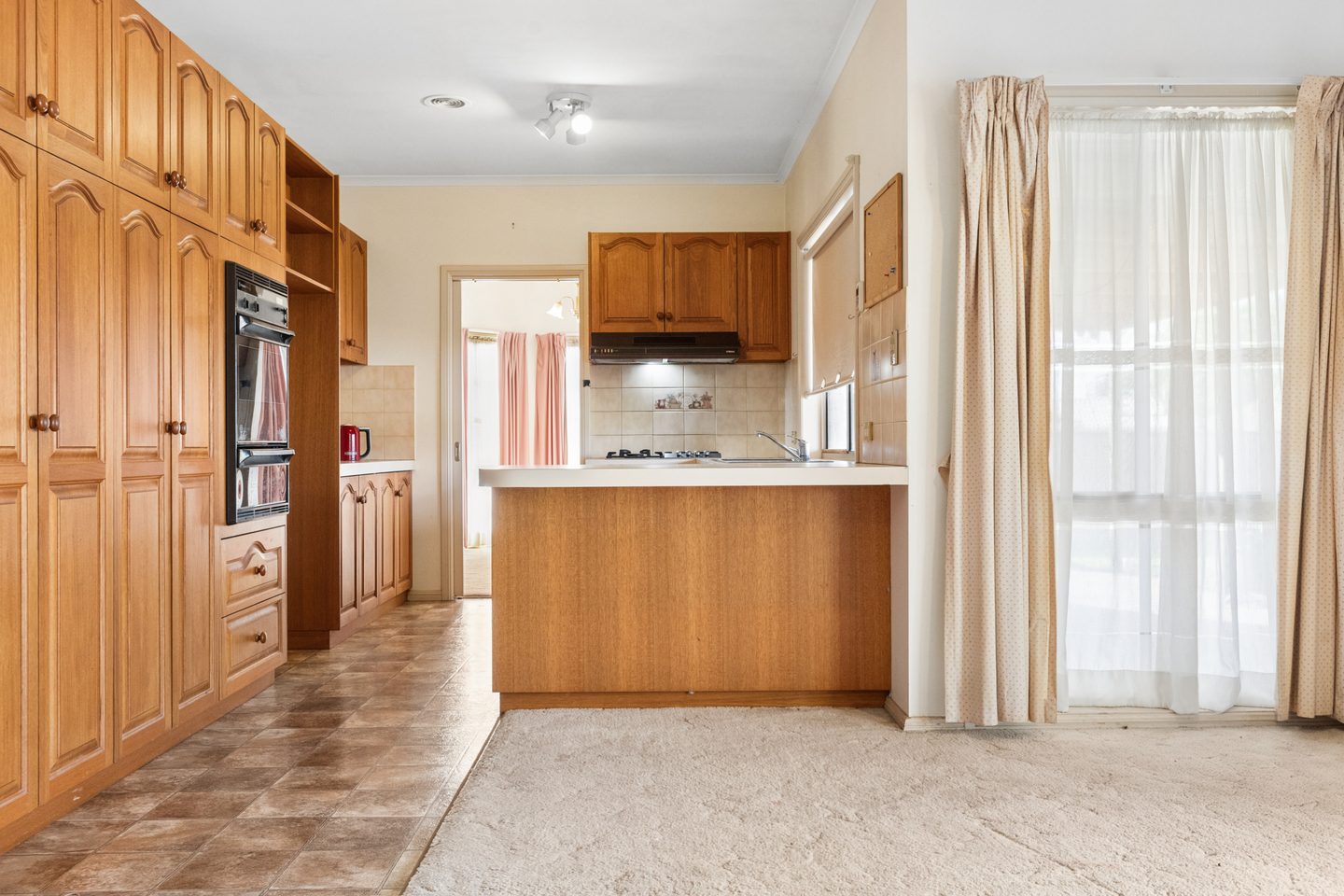 Kitchen and adjoining meals area