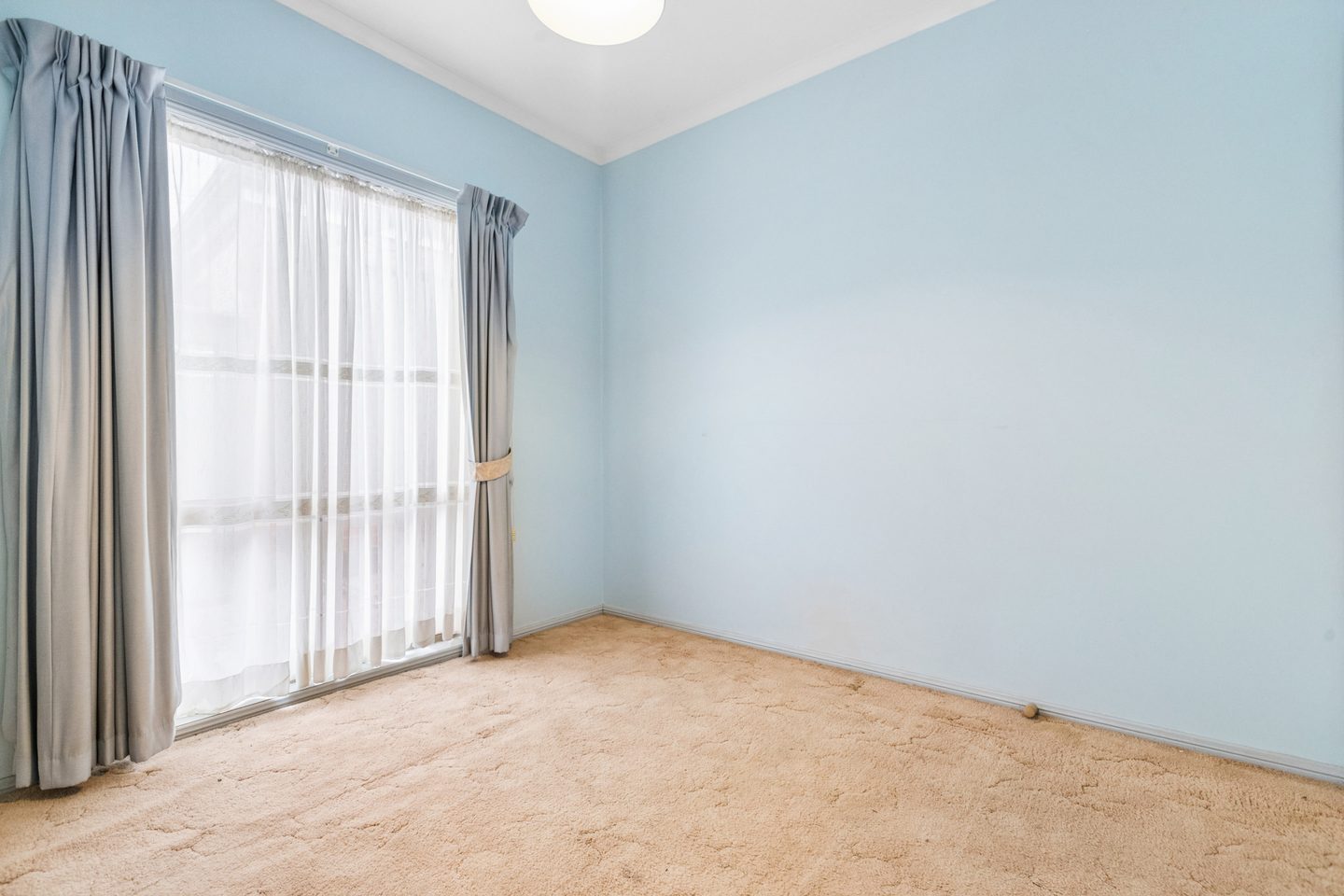 Bedroom with blue walls