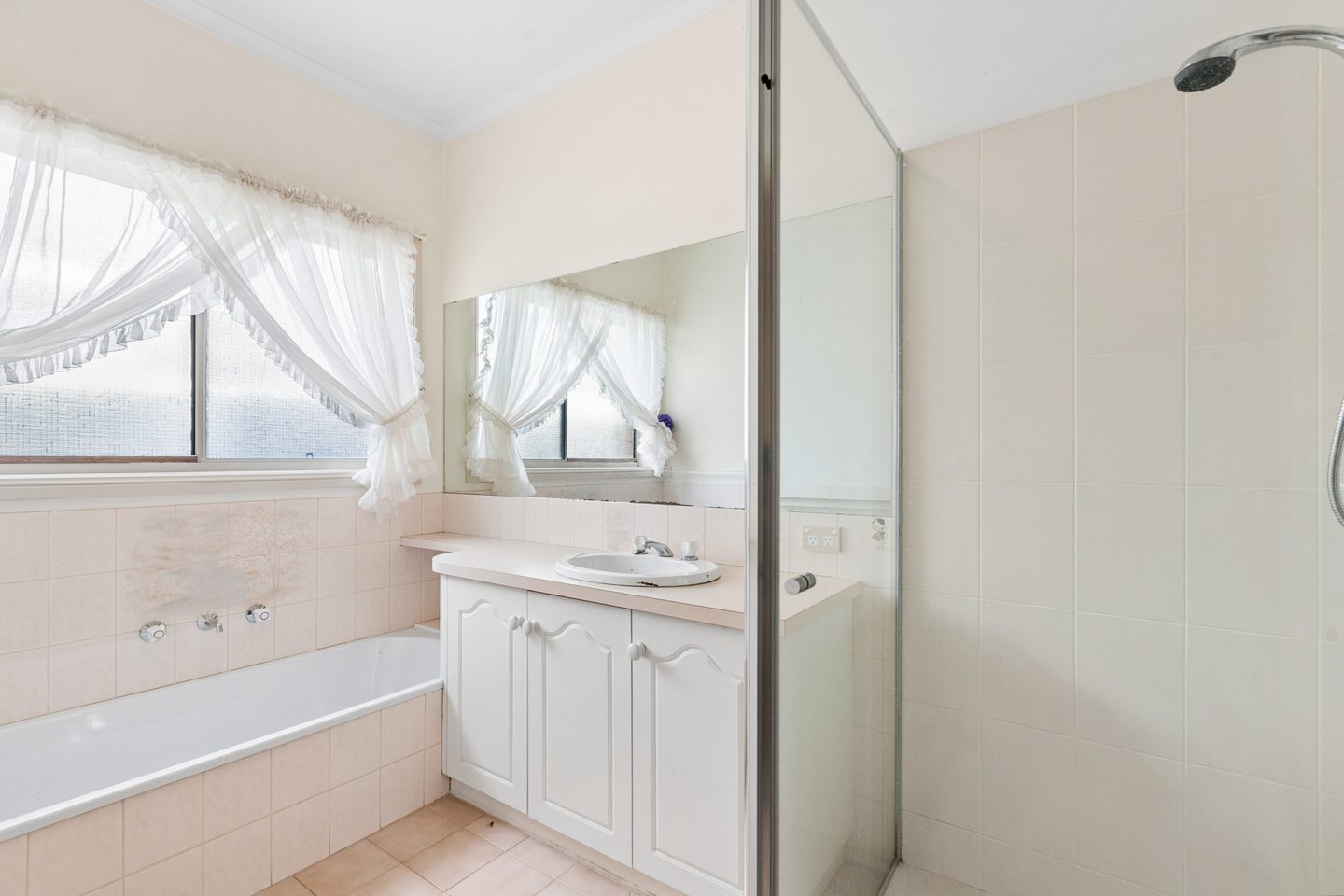 Family bathroom with a separate bath, shower and vanity