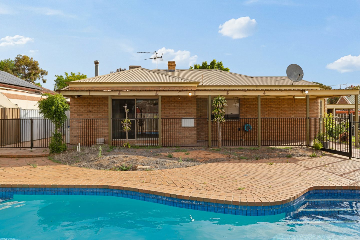 The home from beside the pool
